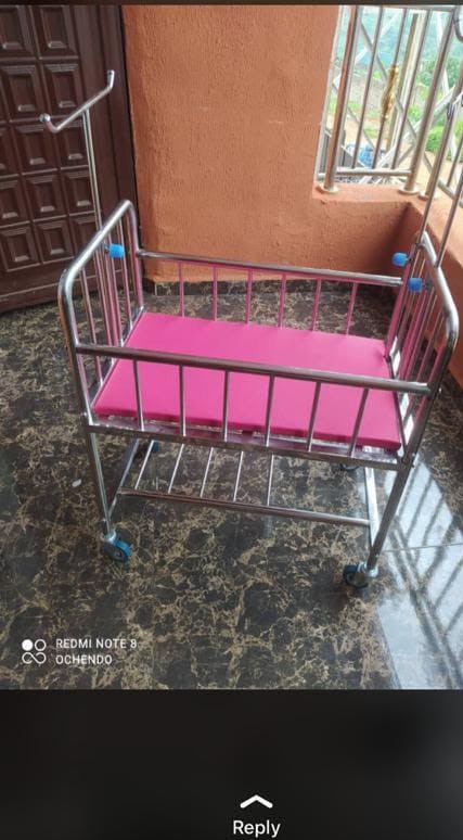 Stainless Steel Pediatric Hospital Cot with Mattress, IV Pole & Castors - View 1